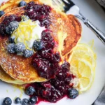 Lemon Ricotta Pancakes with Warm Berry Compote 108 Lemon-Ricotta-Pancakes-with-Warm-Berry-Compote-Recipe